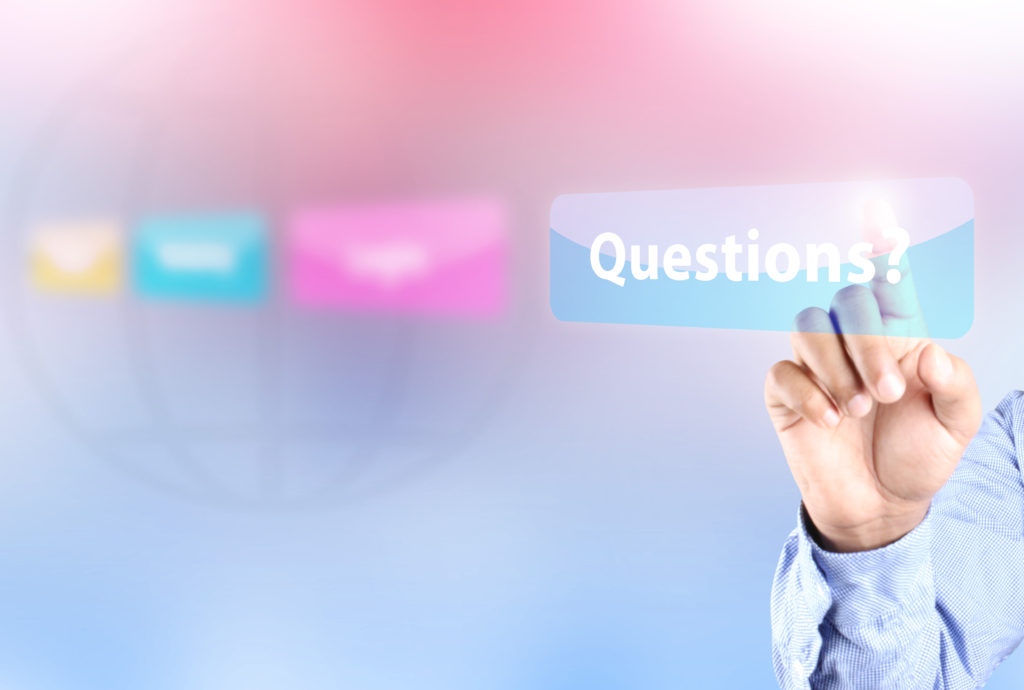 Frequently Asked Questions - Hand pointing to the word "Questions?"